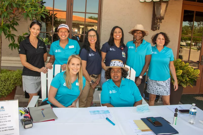 a photo of workers at the Early Learning Center Golf Classic Tournament