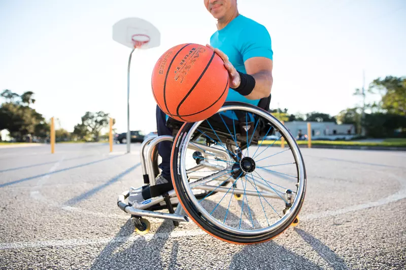 Man in Wheelchair with Basketball