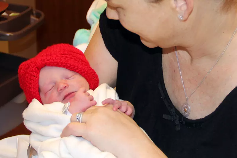 Baby Lexi with red hat for News