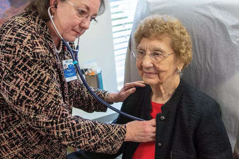 Sharon Kast, FNP, with a patient