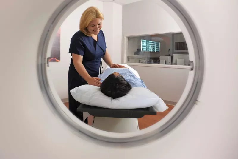Woman preparing for an MRI