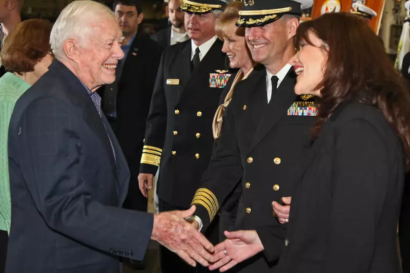Jimmy Carter shaking hands with Marines
