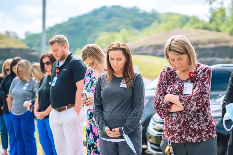 Team members at AdventHealth Manchester gather for National Day of Prayer.