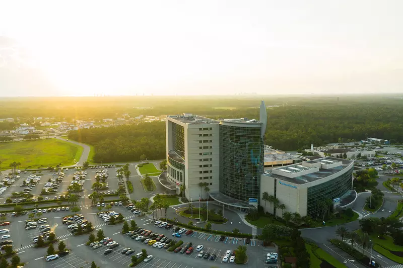 A bird's-eye view of the AdventHealth Daytona building and surrounding area.