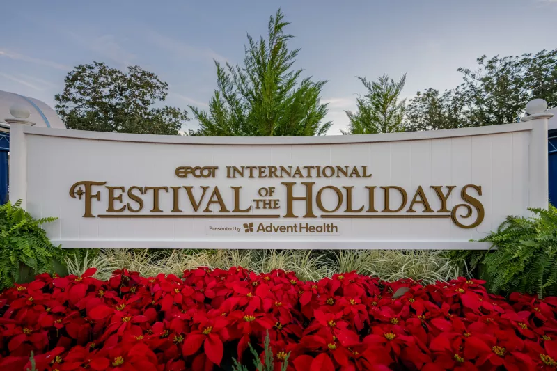 Epcot International Festival of the Holidays sign.