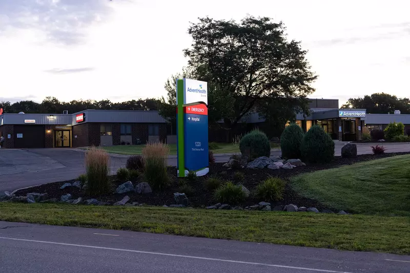 The AdventHealth Durand entrance sign shining at night.