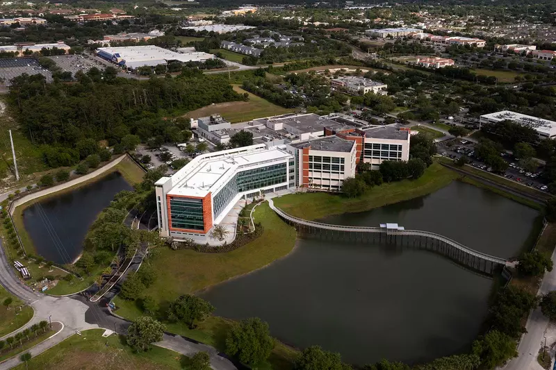 A bird's-eye view of the AdventHealth Fish Memorial building and surrounding area.