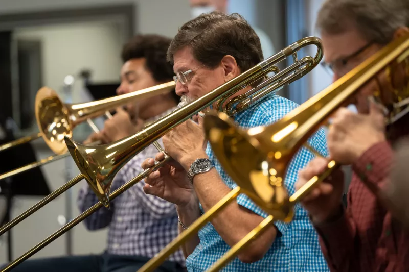 The AdventHealth employee orchestra rehearses.