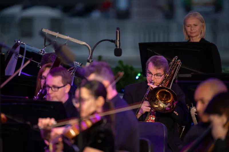The AdventHealth employee orchestra performs at Disney Springs.