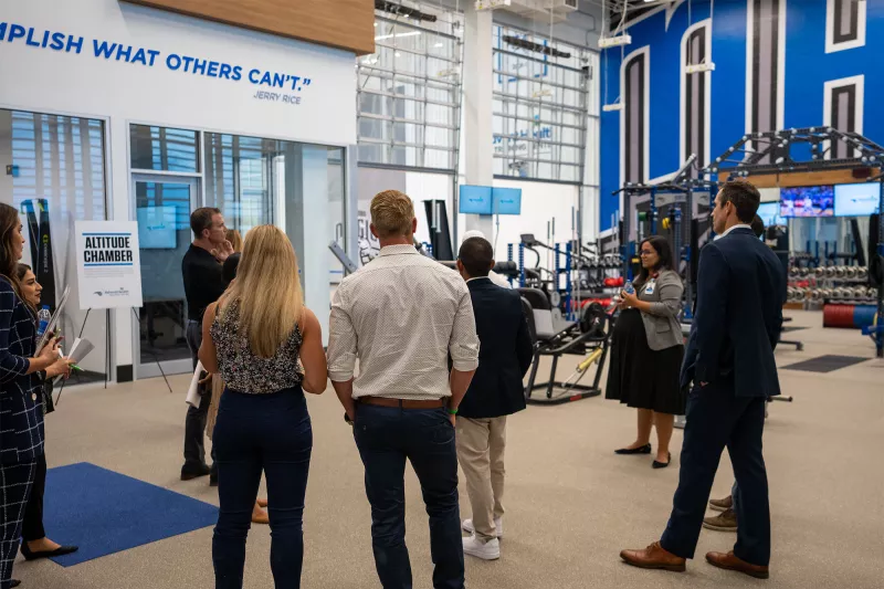 Members of the community learn more about the Orlando Magic Altitude chamber inside the AdventHealth Training Center  
