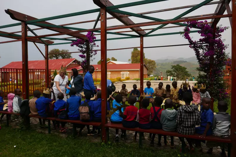 A group of kids with medical employees