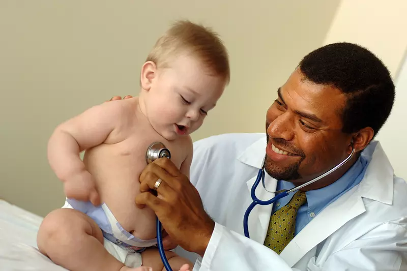 Doctor seeing Baby
