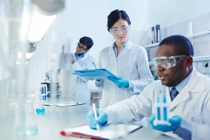 A Group of Doctors Preform Research in a Lab