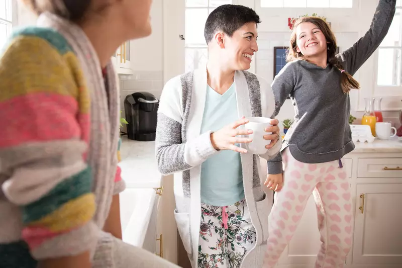 Three women's generations having fun in the kitchen