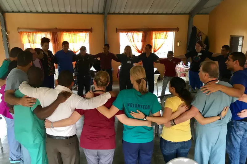 Team prayer on a Honduras mission trip