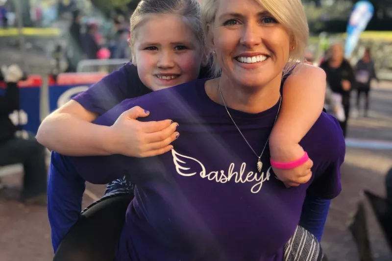 mother and daughter finishing AdventHealth Lady Track Shack 5k