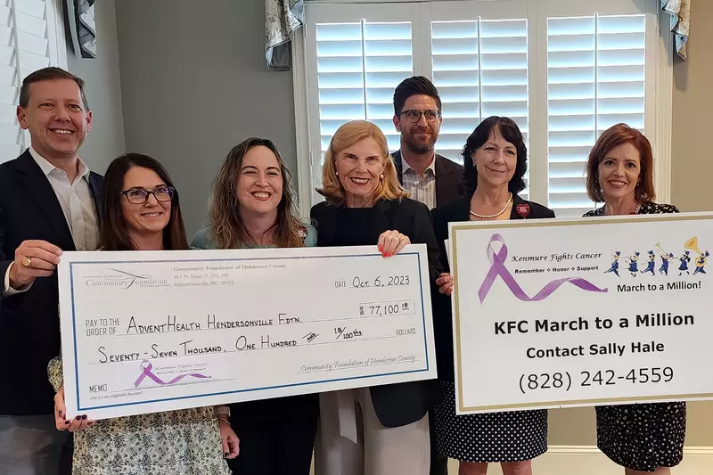 Kenmure Fights Cancer presents check to AdventHealth Hendersonville Foundation.