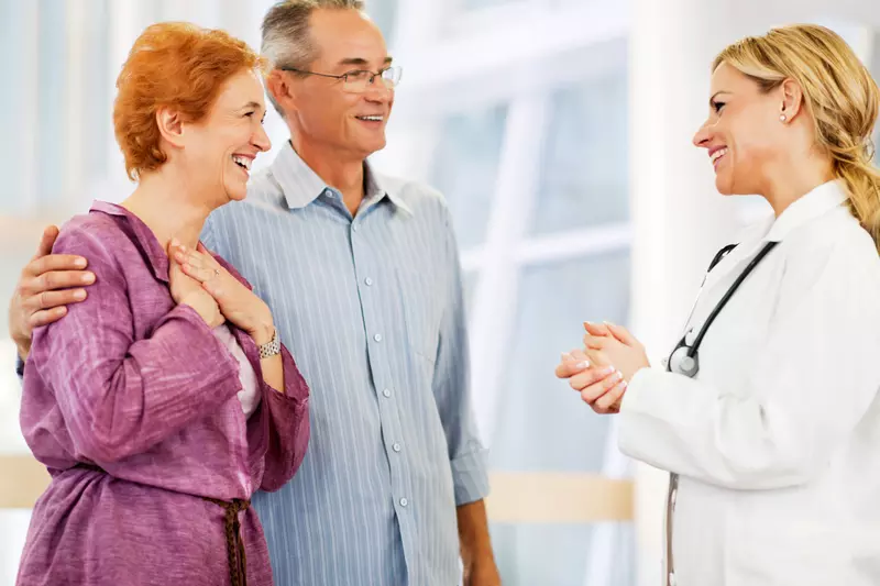 Mature Couple talking to their doctor