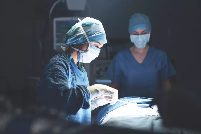 Surgeons Performing Operation