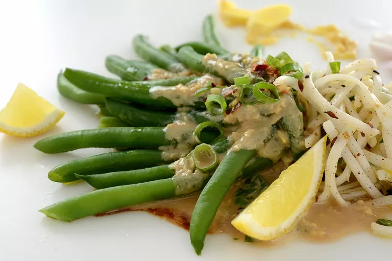 Vegetable dish with tahini and honey infused green beans