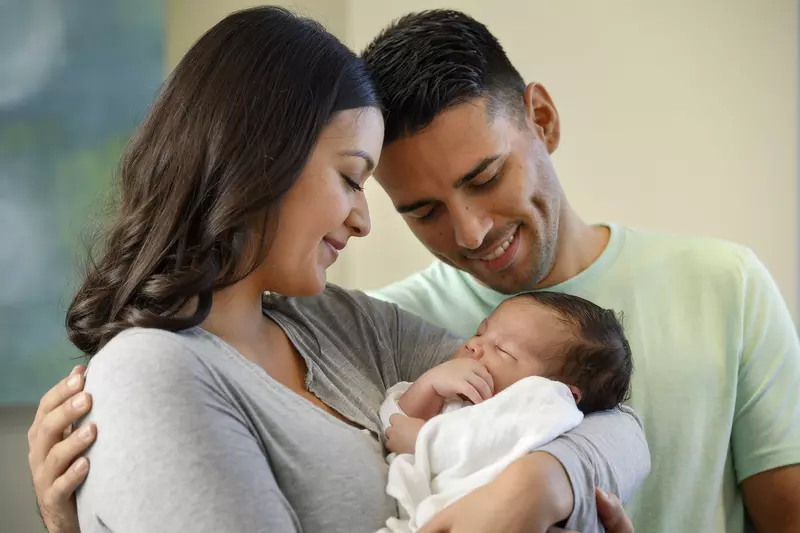 Young parents with new baby