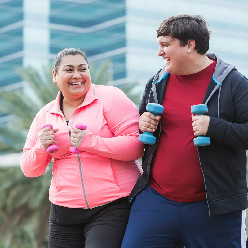 A Man and a Woman Go For a Run Outdoors