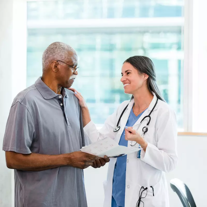 Doctor discussing information with patient