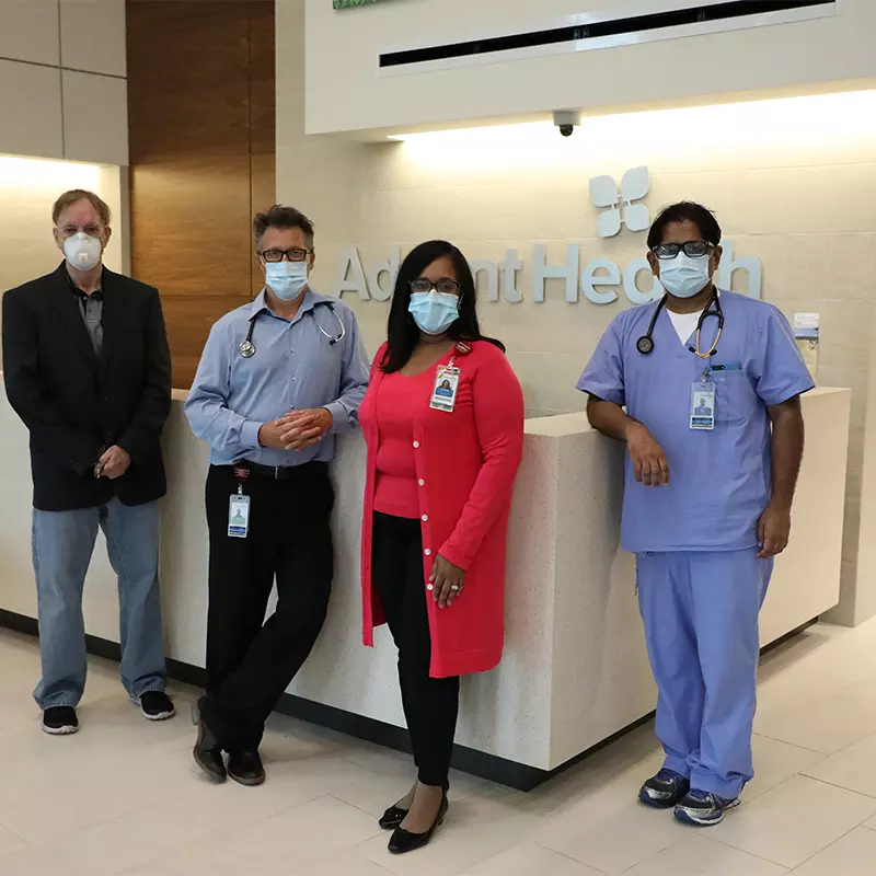 AdventHealth Ocala clinicians pose in the front lobby 