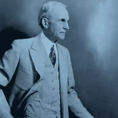 Henry Ford posing for a portrait