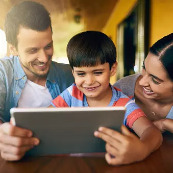 Parents with Boy and Tablet