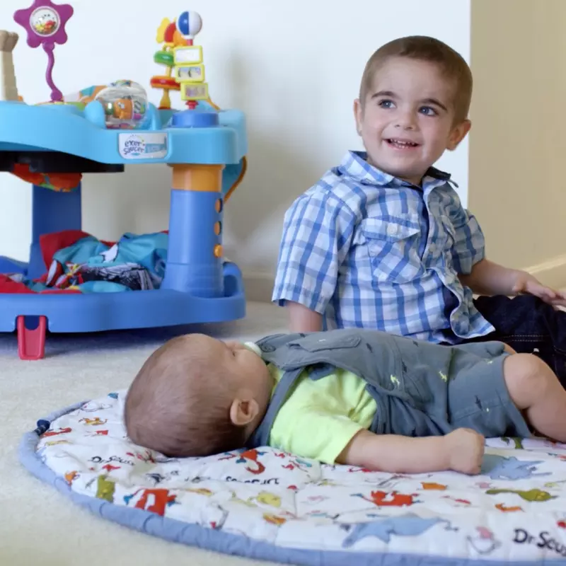 Grant and his younger brother, Wyatt, play on the floor.