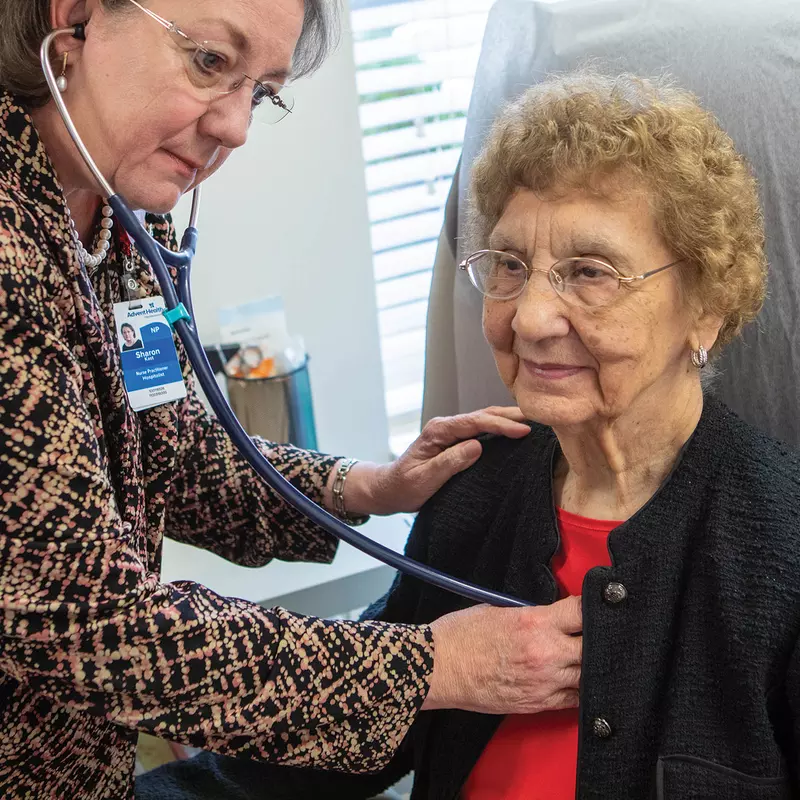 Sharon Kast, FNP, with a patient