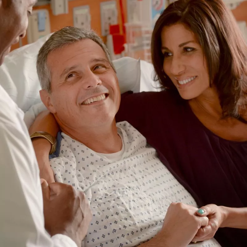 Patient with his wife in the hospital