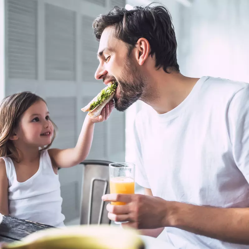 Father and Daughter Eating Healthy