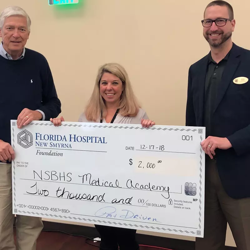 Pictured from left to right: Pat Driver, AdventHealth New Smyrna Beach Foundation chair, Lindsay Posick, New Smyrna Beach High School Medical Academy, and Julian Doster, New Smyrna Beach High School assistant principal. 