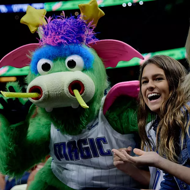 Orlando Magic Mascot and a fan