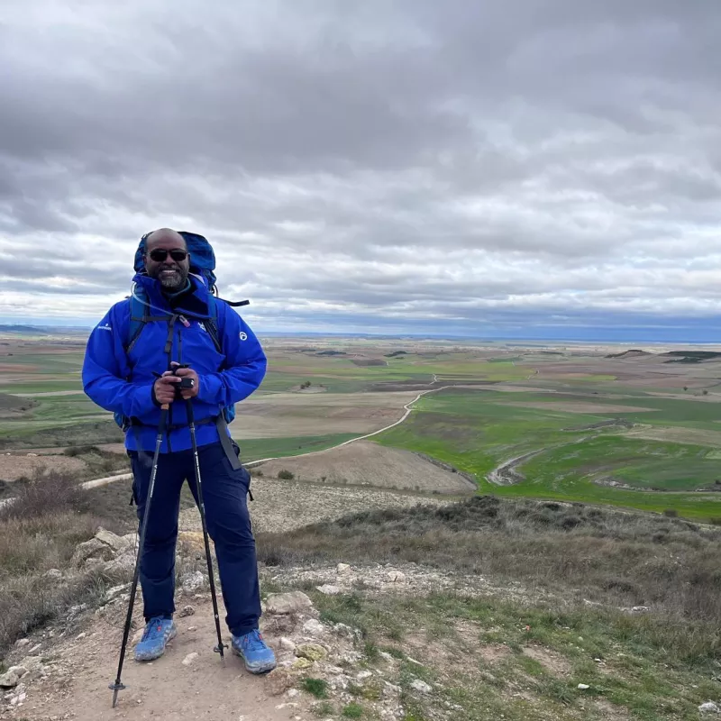 Abel Biri, AdventHealth Waterman president and CEO, walking the pilgrimage in 2023.