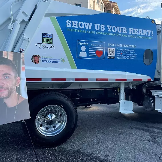 Celebration family honors son’s life-saving organ donation with memorial tribute and public education message on the latest Celebration Sanitation service truck