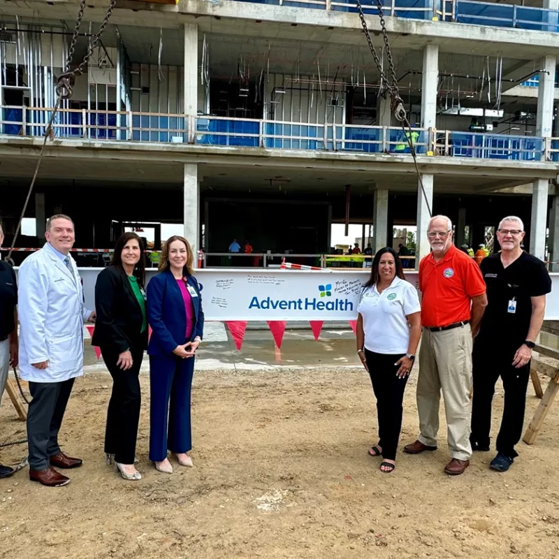 Leaders at AdventHealth Minneola topping-out ceremony