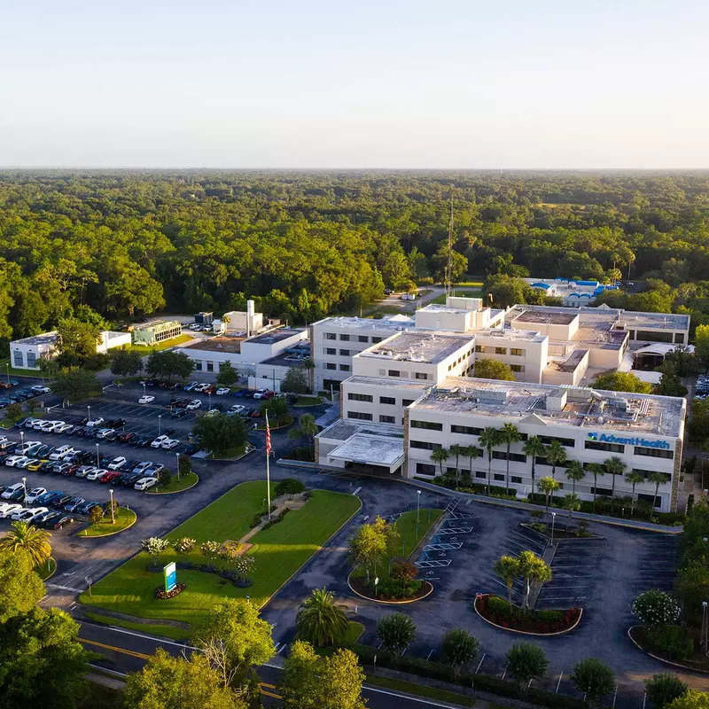 A bird's-eye view of the AdventHealth Deland building and surrounding area.