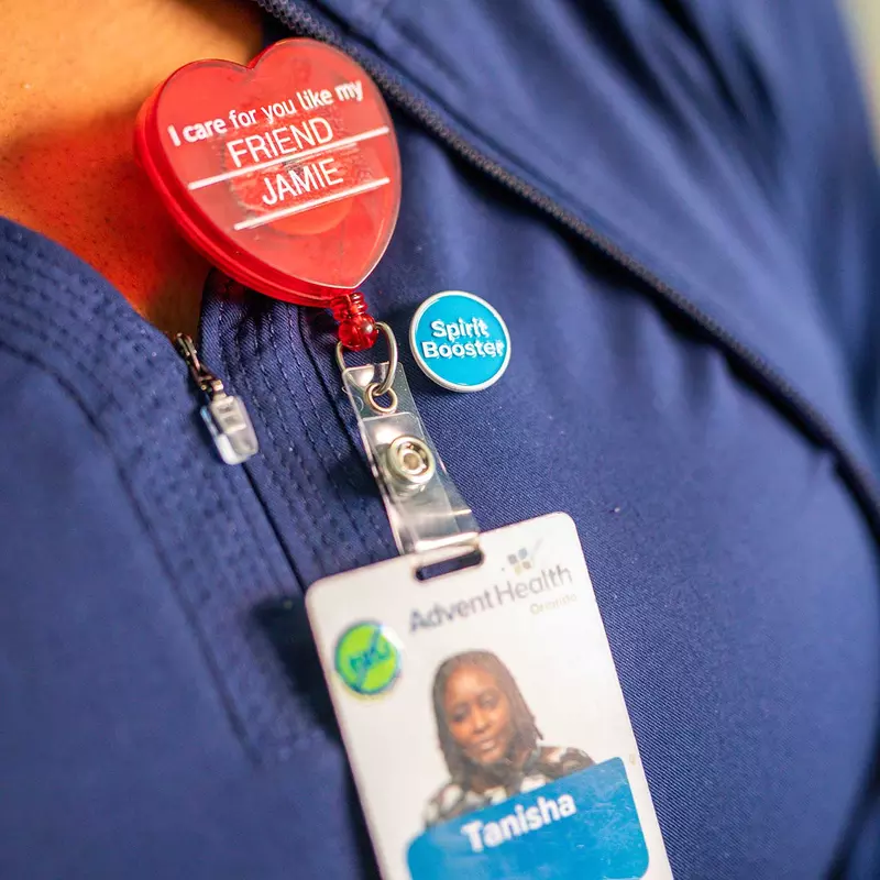 A close-up picture of a AdventHealth nurse's badge