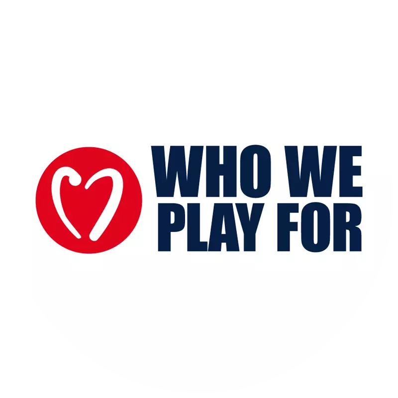 A circle logo of the Who We Play For organization