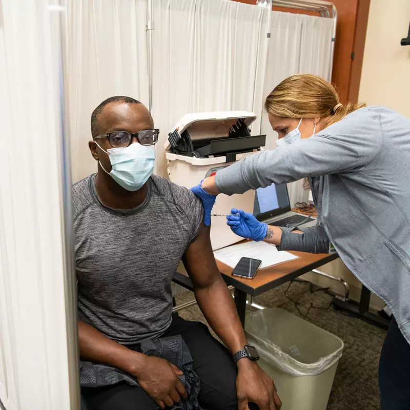 Man receives Pfizer COVID19 Vaccinations at AdventHealth Daytona Beach