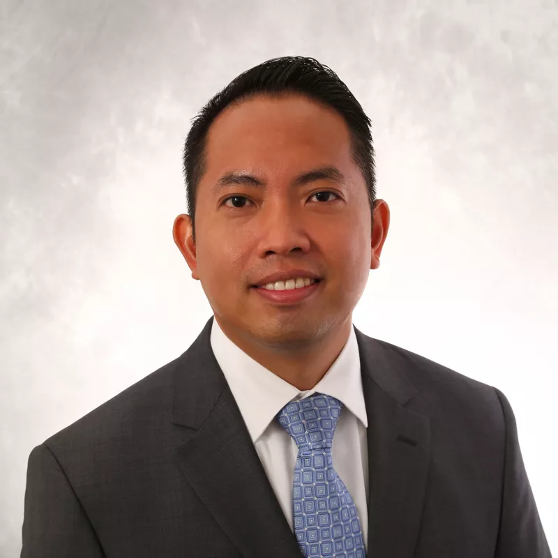 Headshot of Rainer Chan, MD.