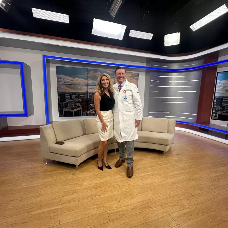 Dr. Daryl Osbahr in the FOX 35 studio with news anchor Amy Kaufeldt