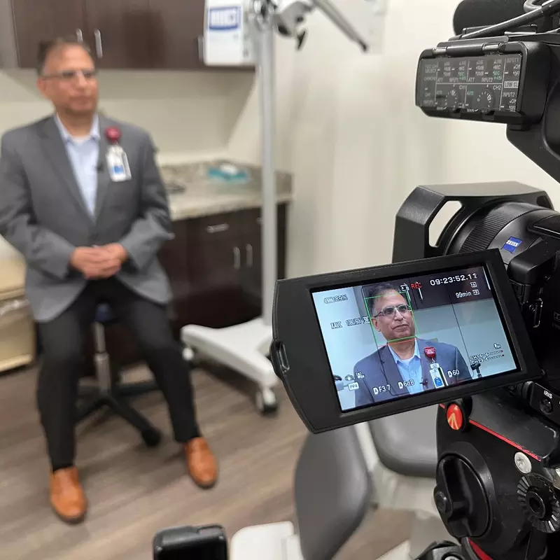 Dr. Aftab Ahmad filming a video for the news.