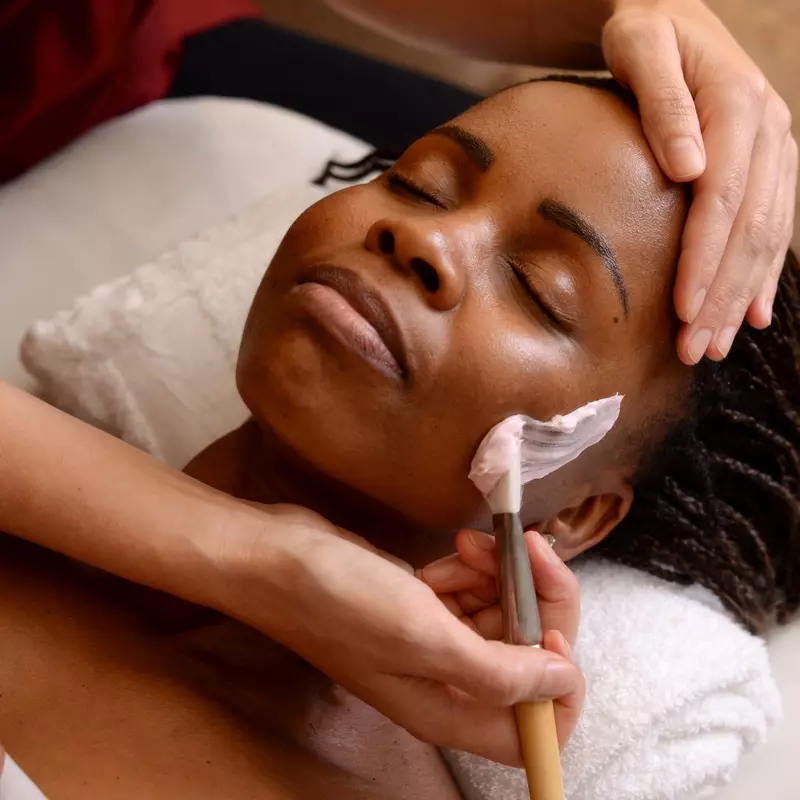 african american lady getting a facial
