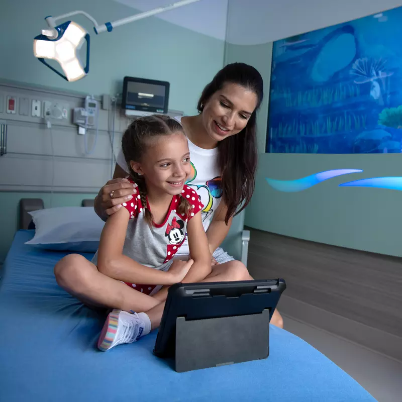 A Mother and Daughter Wait in a Patient Room in AdventHealth at Flamingo Crossing Town Center