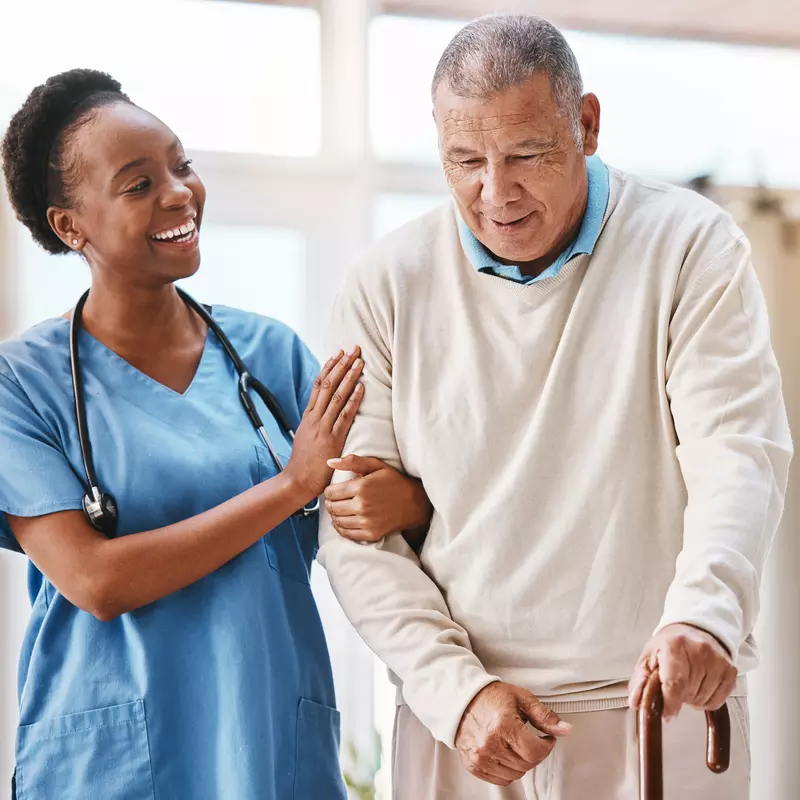 Help, support and medical with nurse and old man and cane for retirement, rehabilitation or healing. Empathy, physical therapy and healthcare with patient and walking stick in caregiver nursing home - stock photo