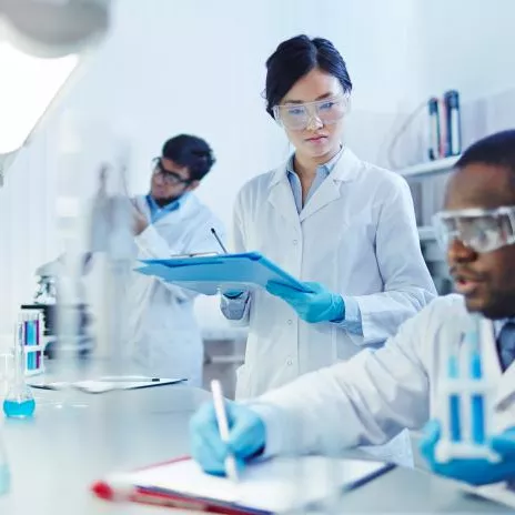 A Group of Doctors Preform Research in a Lab